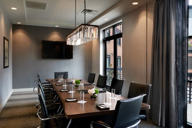 Executive style boardroom with natural light and built in audio visual Executive style boardroom with natural light and built in audio visual